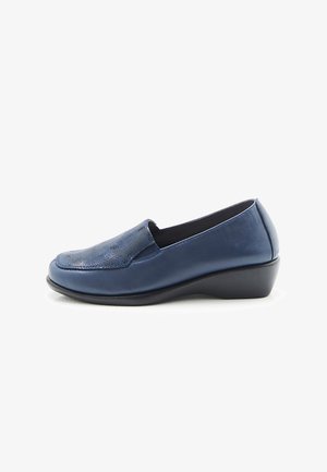 Dark blue leather slip-on shoe with a smooth finish, rounded toe, and a low wedge heel. The upper features a textured pattern.