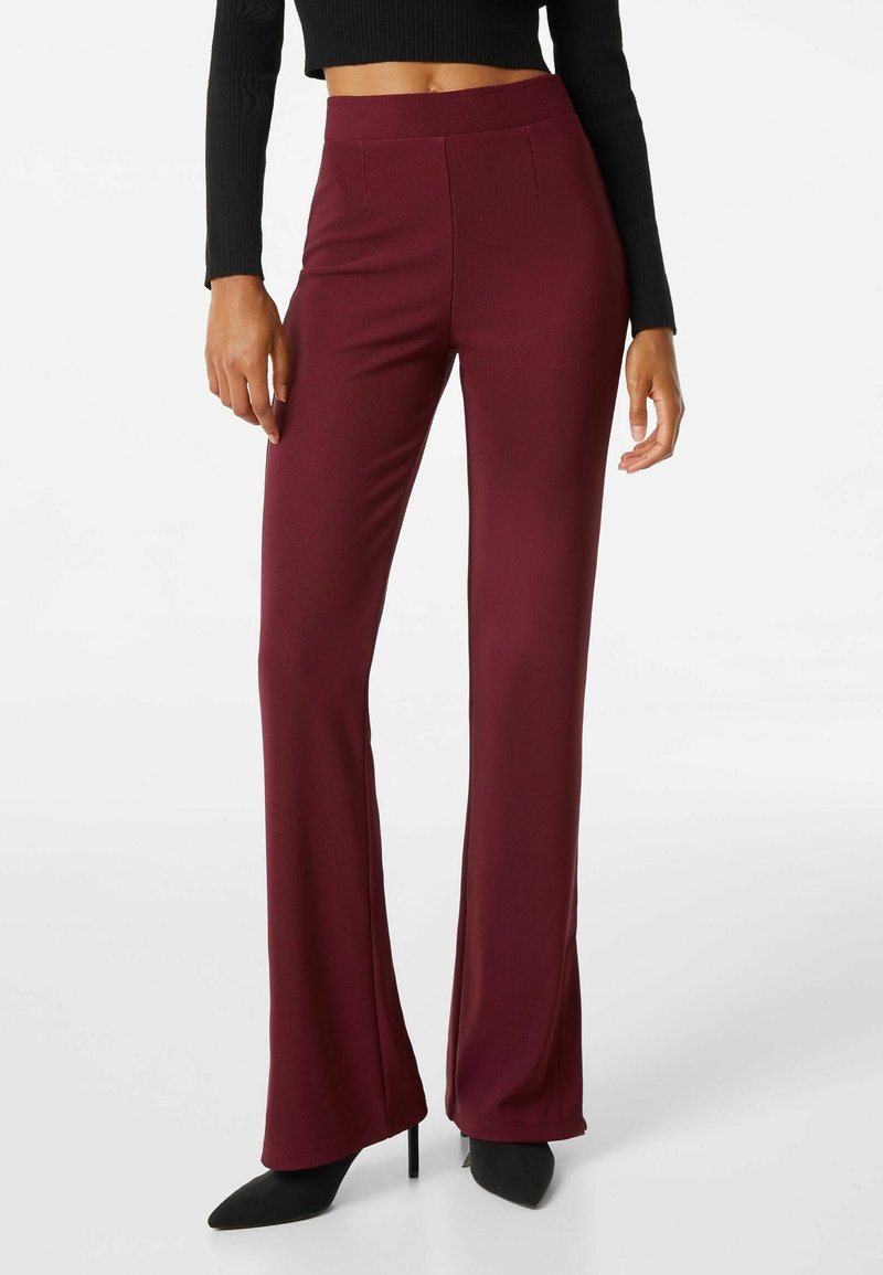 Bershka Tygbyxor - dark red