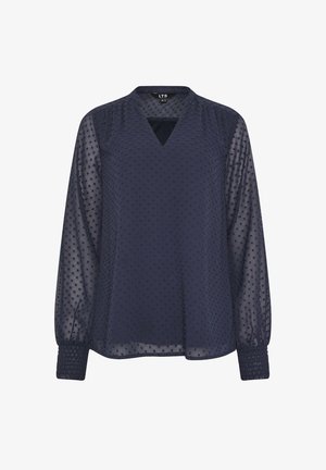 Mørkeblå bluse med lange ærmer, tekstureret prikket mønster, V-halsudskæring, gennemsigtige ærmer og rynkede manchetter.