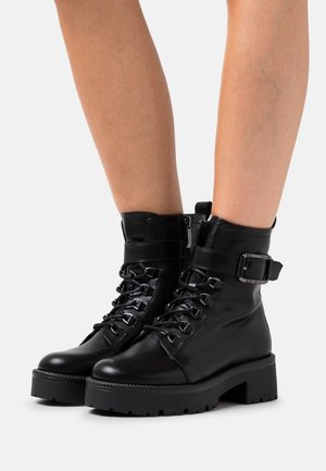 Stivaletti con plateau - black