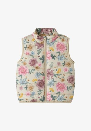 Ujjatlan, bézs színű, steppelt mellény elülső cipzárral, több színű virágmintával, rózsaszín, lila, kék, sárga és zöld árnyalatokban.