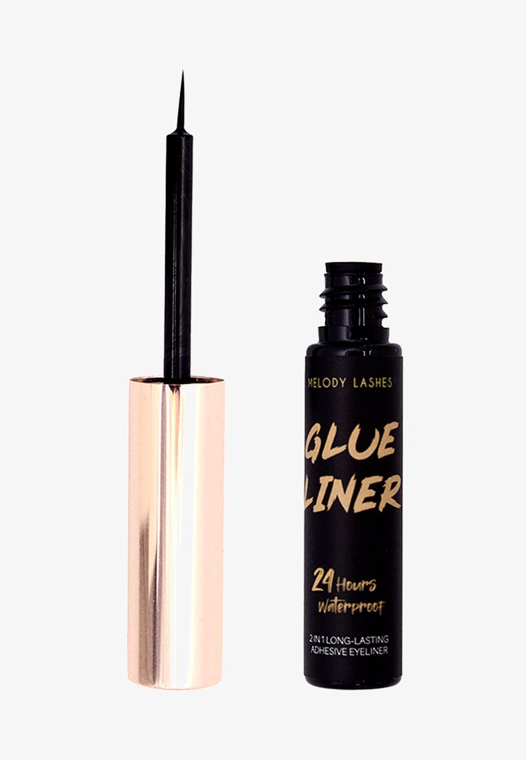 Zwarte verlijmende eyeliner in een glanzende zwarte tube met gouden accenten. Beschikt over een fijne, puntige applicator voor nauwkeurig gebruik.