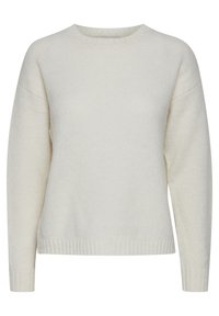 Pull crème en tissu doux et texturé. Il présente un col rond, des épaules baissées et un ourlet côtelé.