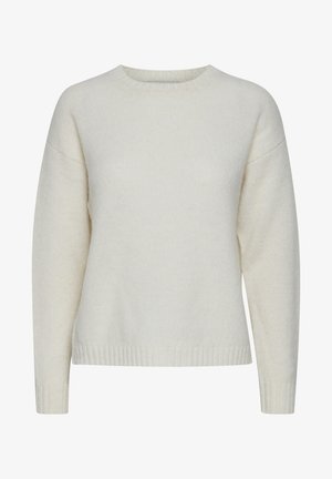 Kreminės spalvos megztinis, pagamintas iš švelnios, tekstūruotos medžiagos. Yra apvalios iškirptės, nuleistais pečiais ir briaunuota apatine dalimi.