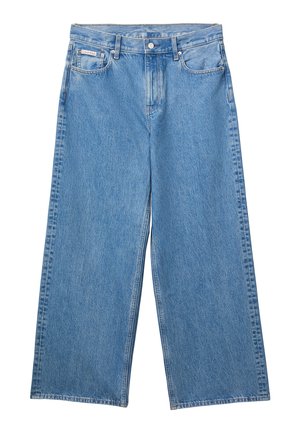 Μπλε τζιν παντελόνια με φαρδιά μπατζάκια, εμπρόσθιο κουμπί και φερμουάρ, θηλιές για ζώνη και ετικέτα Calvin Klein στην μικρή μπροστινή τσέπη.