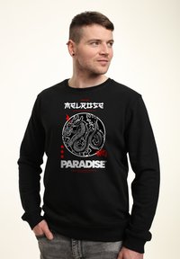 Černá mikina se grafickým designem draka, červenými akcenty a textem "MELROSE" a "PARADISE" v kontrastních barvách.