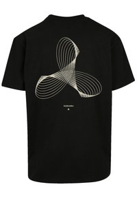 Black t-shirt featuring a central abstract design made of cream-colored, intersecting lines. Short sleeves and standard fit.