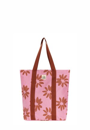 Roze draagtas met roestkleurige bloemmotieven en bijpassende lange hengsels, voorzien van een klein rechthoekig logoplaatje in het midden aan de voorkant.