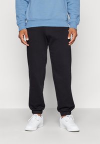 Champion ICONS CUFF PANTS - Jogginghose - black