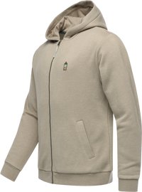 Beige zip-up hoodie with front pockets, ribbed cuffs, and a small green bottle emblem on the left chest, displayed against white background.
