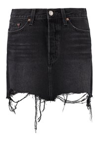 Black denim skirt with a high waist, featuring a raw hem and frayed edges. Copper button and stitching details accent the design.