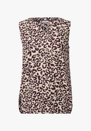 Top sans manches crème avec un imprimé léopard couleur vin. Il présente un décolleté en V et une coupe décontractée avec des fentes sur les côtés à l'ourlet.