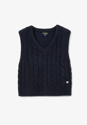 Chaleco de punto azul marino con escote en V, que presenta patrones de trenzas y dobladillo acanalado. Pequeño detalle de corazón blanco en la esquina inferior derecha.