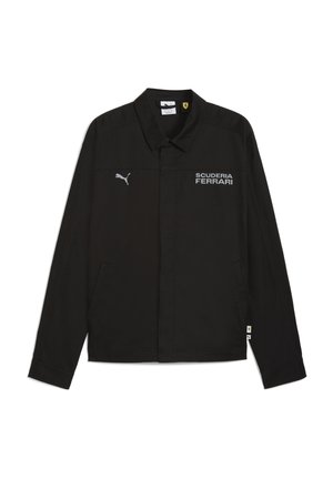Black jacket with a collared neck, featuring "SCUDERIA FERRARI" in white text. Soft fabric, two side pockets, and embroidered logo accents.