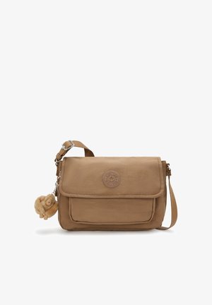 Brown rectangular shoulder bag with front flap pocket, adjustable strap, round logo patch, and small plush monkey keychain attached.