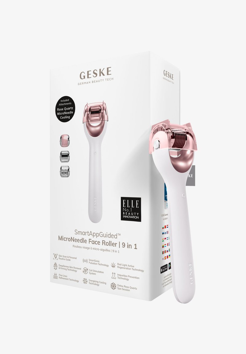 Mikronål ansiktsrulle med ett vitt ergonomiskt handtag och roséguld-accenter; inkluderar bilagor. Boxen har detaljerade teknologibeskrivningar.