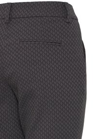 Dark patterned trousers with a textured design, featuring a single back pocket and a smooth waistband. The fabric shows a subtle diamond pattern.