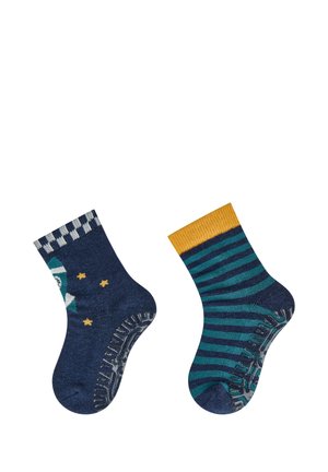 Zwei marineblaue Kleinkind-Socken mit rutschfesten Sohlen; eine mit Stern- und Mondmuster, die andere mit türkisen Streifen und gelbem Bund.