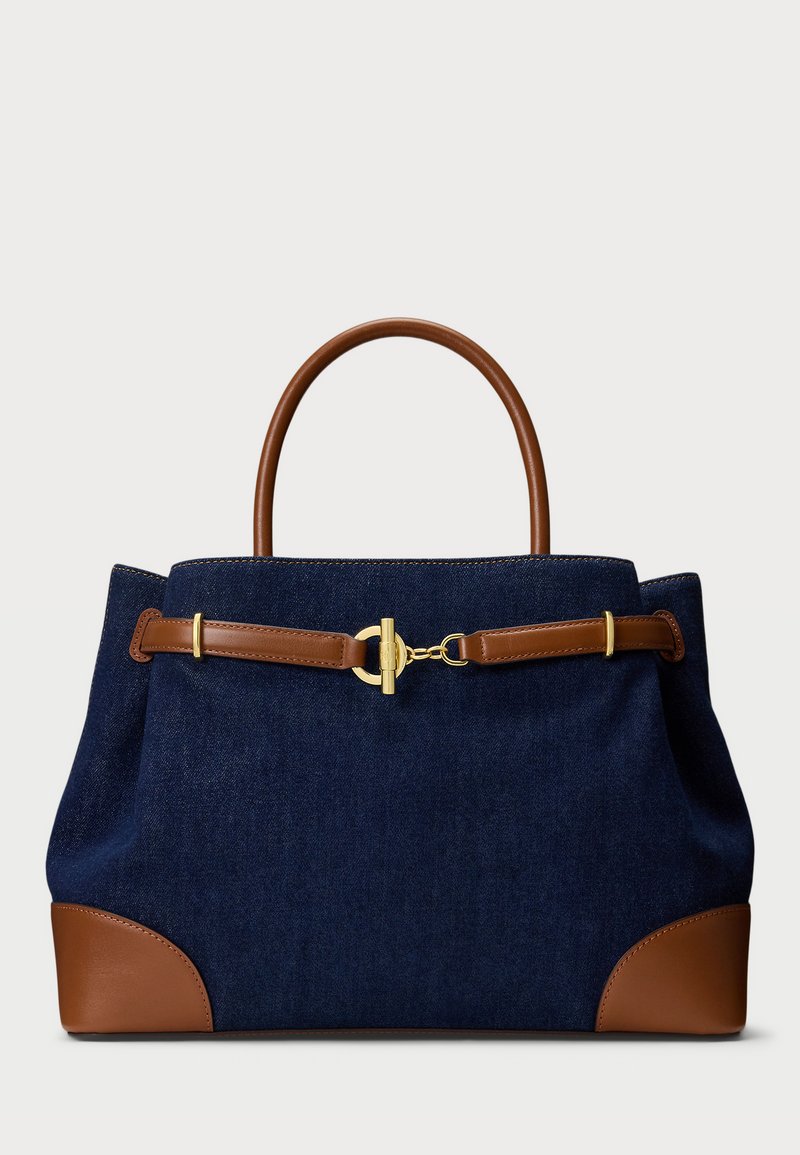 Granatowa torba z dżinsu z brązowymi skórzanymi akcentami, o sztywnej formie, z podwójnymi uchwytami u góry oraz złotym zapięciem. Posiada zaokrąglone narożniki na dnie.