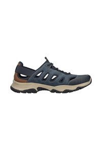 Dunkelblaue Lederschuhe mit beiger Sohle und braunen Akzenten. Verfügen über Ausschnitte an den Seiten und eine erhöhte Rückseite für Unterstützung.