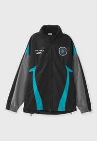 Black jacket with teal and gray accents, featuring a high collar, zip front, and logo patch on the chest. Smooth texture, sporty design.