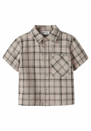 Beigen värinen lyhythihainen nappipaita, jossa mustavalkoinen ruudullinen kuosi ja etutasku rinnassa.