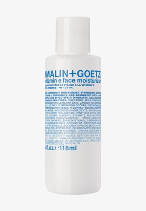 Weiße Kunststoffflasche mit glatter Oberfläche, mit blauer Schrift. Enthält 118 ml Vitamin E Gesichtsmositurizer mit Klappdeckel.