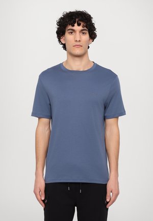 Blue short-sleeve t-shirt made of soft material. Features a round neckline and a small logo on the chest. Simple, solid color design.