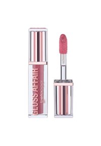 Lucidalabbra rosa in un tubetto rettangolare trasparente con un tappo argento e oro rosa. L'applicatore ha una punta pelosa per un'applicazione facile.