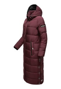 Long burgundy puffer coat with a hood, featuring quilted sections, two side pockets, and snap closures at the hem. Black lining and accents.