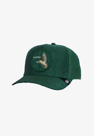 Dark green mesh-back cap with "BLESSED" text and embroidered flying eagle on front panel with subtle circular embossed pattern.