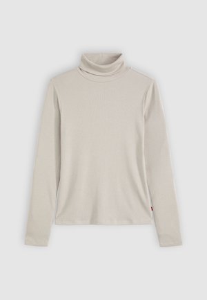 Lys beige ribbet turtleneck top med lange ærmer, der har et tætsiddende design og subtil struktur. Sideetiket synlig ved sømmen.