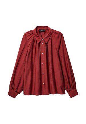 Blouse à manches longues avec boutons, de couleur rouge foncé, dotée d'un col pointu, de tissu froncé aux épaules et de larges poignets.
