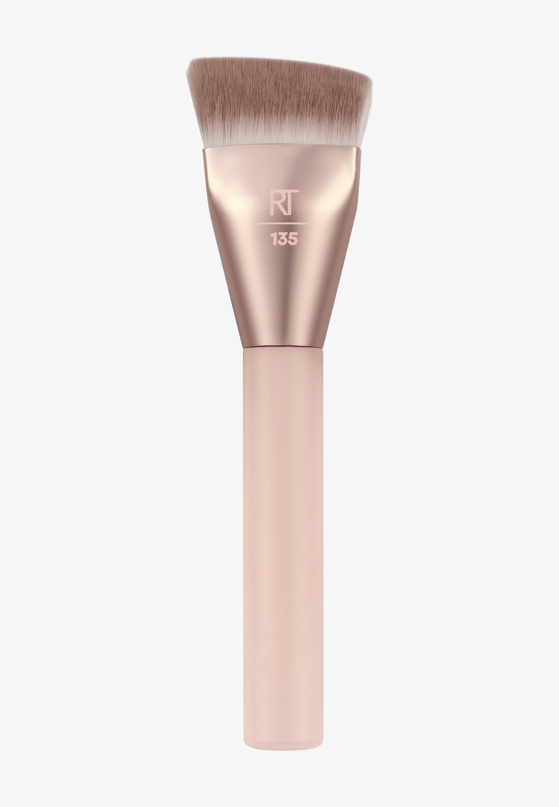 Makeup brush with angled, dense bristles and a rose gold ferrule, beige handle, marked "RT 135" on the ferrule.