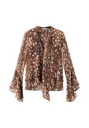 Blusa marrón de manga larga con manchas blancas, bajo asimétrico en capas, puños acampanados y detalle de lazo largo en el cuello.