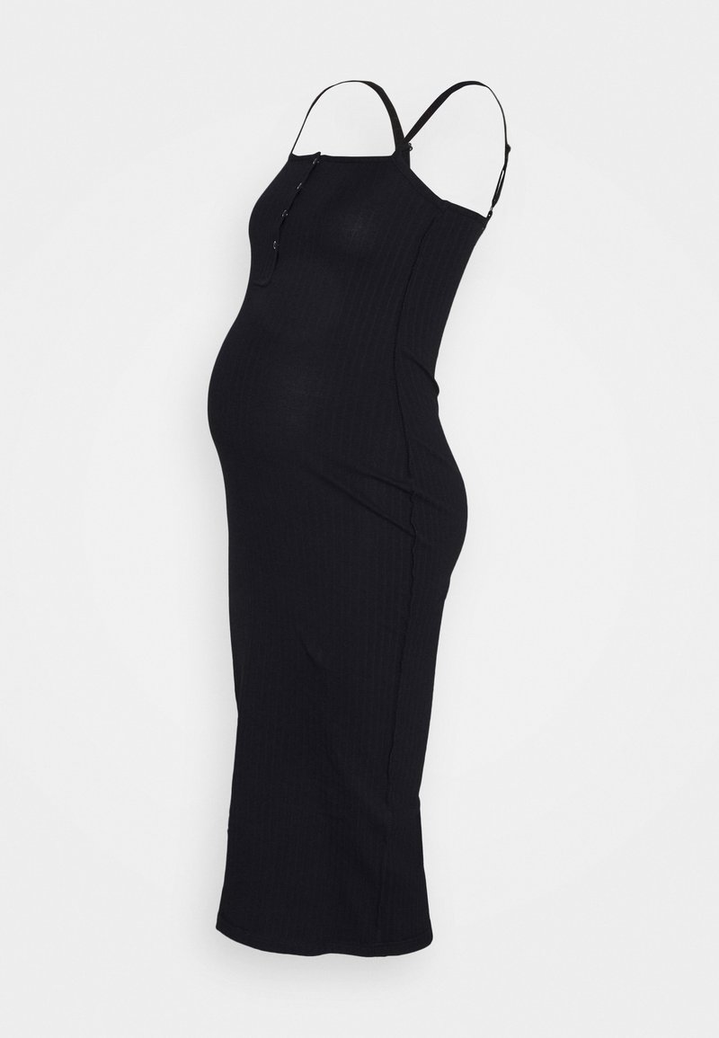 Vestido de maternidade preto com texturização canelada, alças finas ajustáveis, corte até ao joelho e detalhe de botões de pressão na frente, destacando um design ajustado.