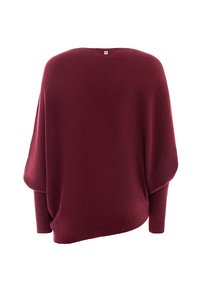 Maglione bordeaux oversize con design a batwing, texture morbida e polsini a coste. Presenta un retro arrotondato e una minimale etichetta sul colletto.