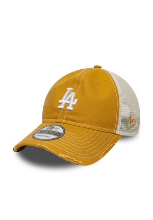 Mustard yellow and white mesh baseball cap with white "LA" logo and a curved brim with distressed details. Adjustable fit with brand sticker on brim.