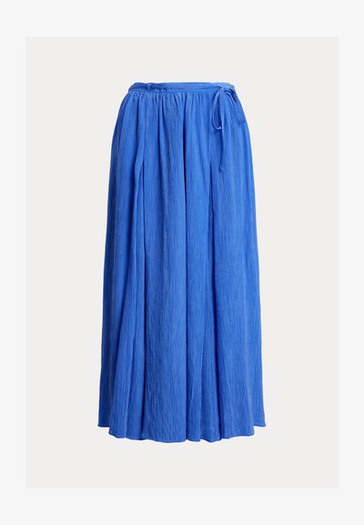 Modra, dolga, nabirana krila iz teksturirane tkanine. Ima elastičen pas z detajlom za zavezovanje, kar omogoča prilagoditev.