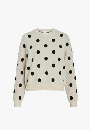 Hele beež värvusega kampsun mustade täppidega, ümar kaelus ja soonilised varrukaotsad. Pehme kootud tekstuuriga, lõdva istuvusega ja ilma nähtavate kinnitusteta.