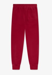 Jordan BASELINE PANT UNISEX - Pantalon de survêtement - gym red