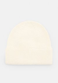 Bezhivul de tricot cu o textură ribbed. Are un tiv pliant și un design conic în partea de sus, realizat dintr-un material moale.
