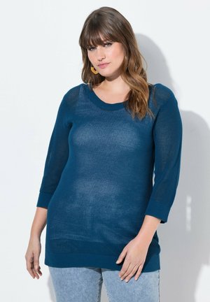 - Sweter