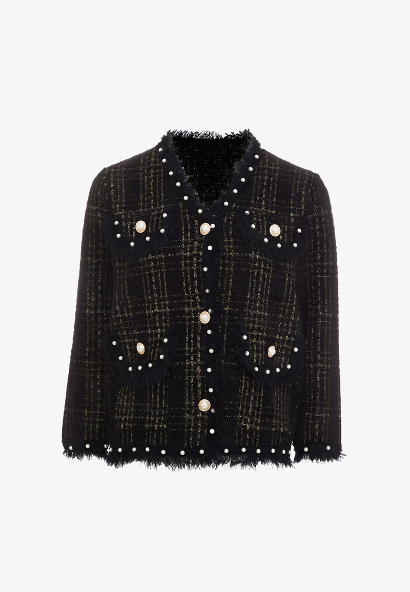 Fekete és arany kockás dzseki gyöngygombokkal és rojtokkal. Két elülső zsebbel rendelkezik díszgyöngyökkel és texturált anyaggal.