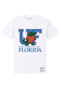 Hvid bomulds T-shirt med blå "UF" bogstaver, en grøn alligator iført en orange skjorte, og "University of Florida" i blåt nedenfor.