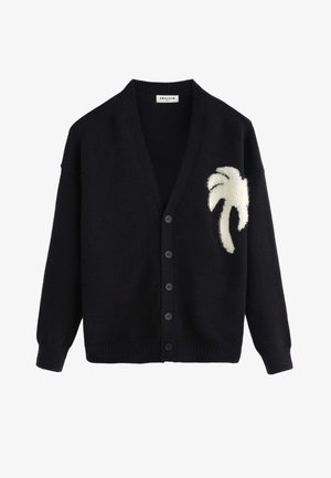 Cardigan noir boutonné avec poignets et ourlet côtelés, arborant un motif texturé blanc en forme de palmier sur le côté gauche de la poitrine.