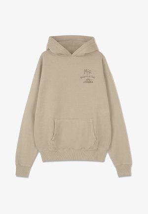 Beige hoodie van zachte stof, met een voorzak, ribgebreide mouwen en zoom, met de tekst "Whispers of Gold" en een afbeelding op de borst.