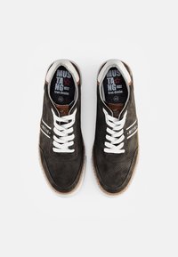 Brown suede athletic shoes with white laces, perforated upper, and a brown leather accent. Textured rubber sole; size 42.