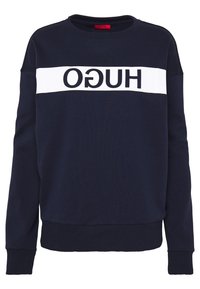 Sudadera azul marino hecha de mezcla de algodón con una franja horizontal blanca que presenta la palabra "HUGO" en letras negras en negrita en el pecho.