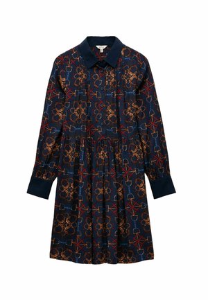 Dunkelblaues Kleid mit Kragen, langen Ärmeln und elastischem Bund. Präsentiert ein geometrisches Muster in Rot und Gold. Hergestellt aus weichem Stoff.